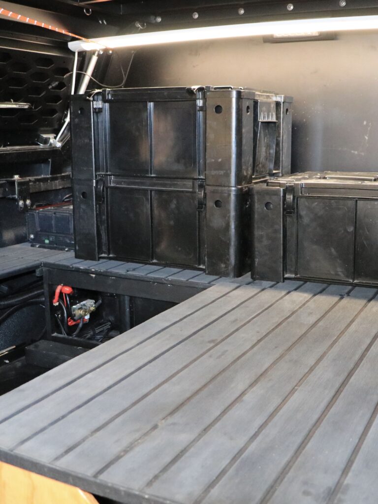 dual cab ute tub canopy storage setup ideas for touring with a truck bed. Ammo box pantry.