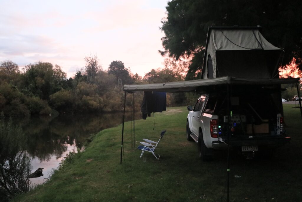 Roof top tent touring with a dual cab ute tub canopy setup or truck bed.  ironman hardshell swift 1400 with deltawing. 