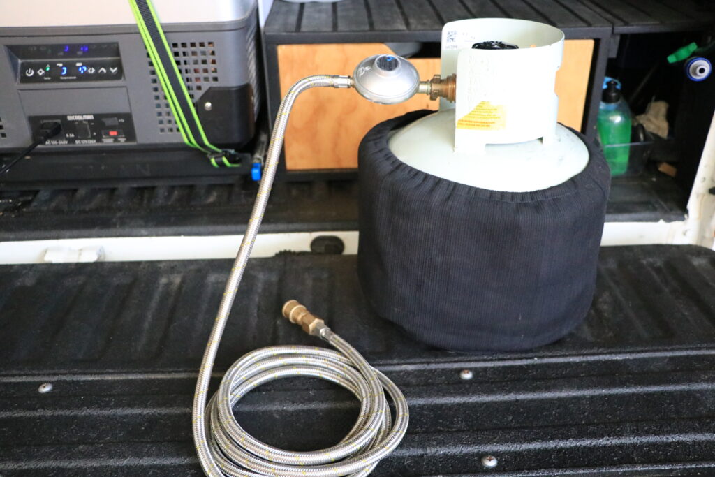 Dual cab ute tub canopy storage setup ideas for touring with a truck bed. Storage ideas for Gas bottle.