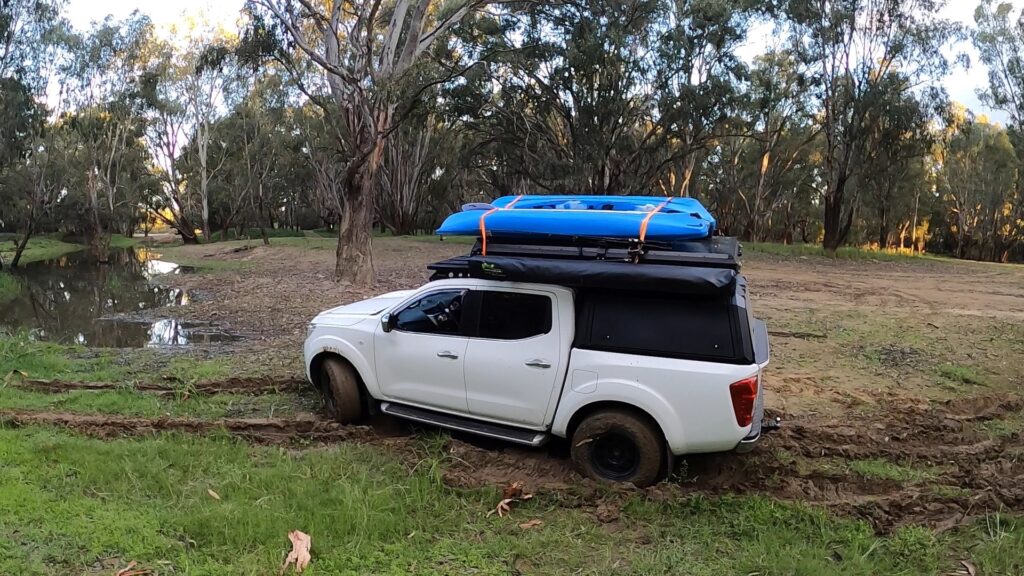 Roof top tent touring with a ute tub or truck bed. The idea to fitout with a camping layout and plan, to make this the ultimate touring canopy, ute camping setup. ironman hardshell swift 1400 with a kayak on the roof. dual cab tub canopy setup